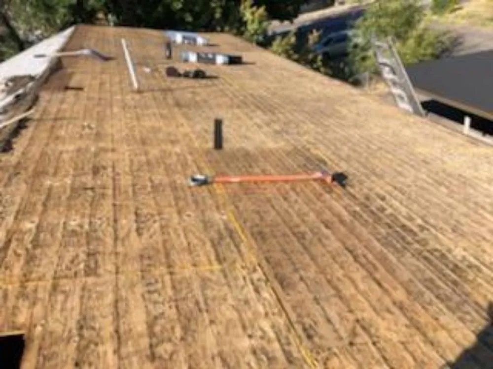 Slide of Esquivel Roofing and general construction