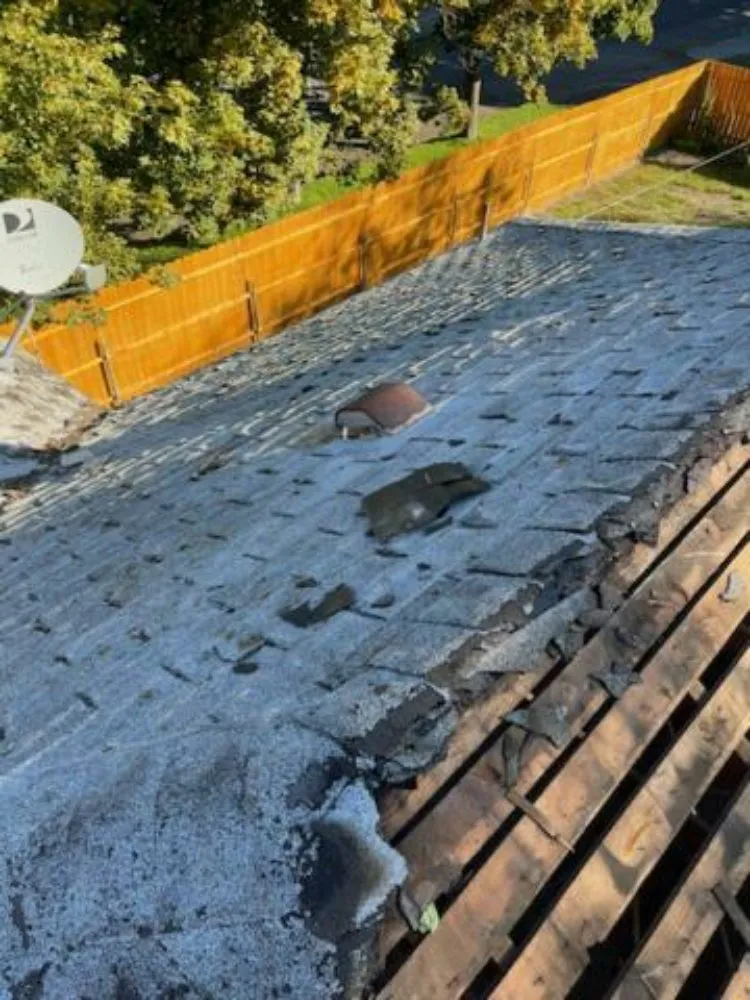 Slide of Esquivel Roofing and general construction