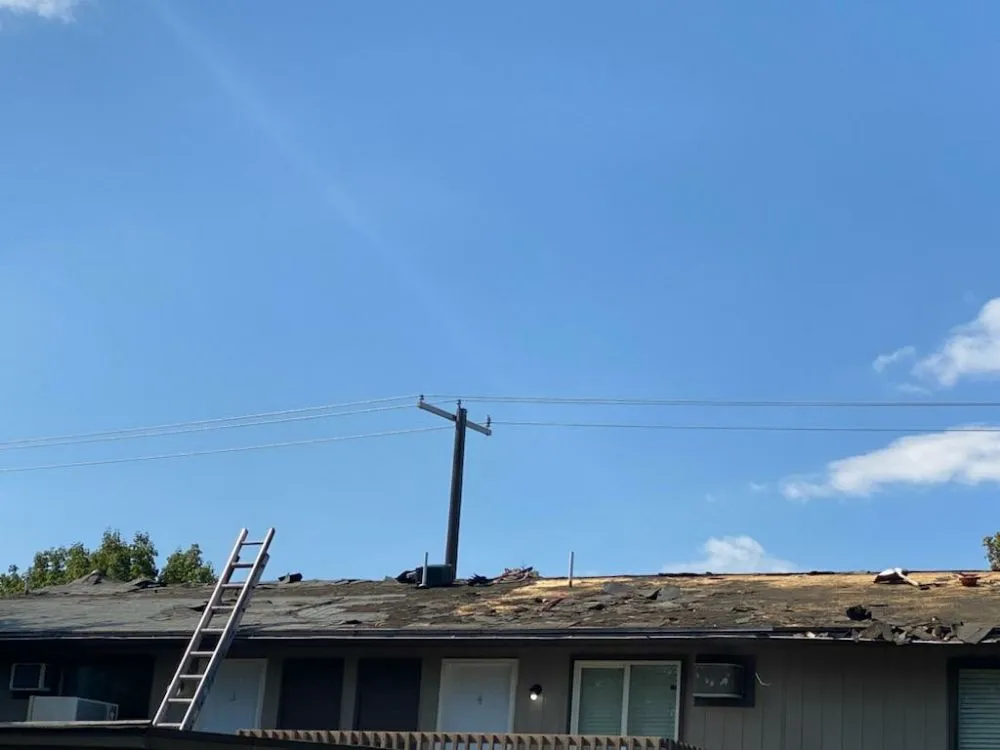 Slide of Esquivel Roofing and general construction