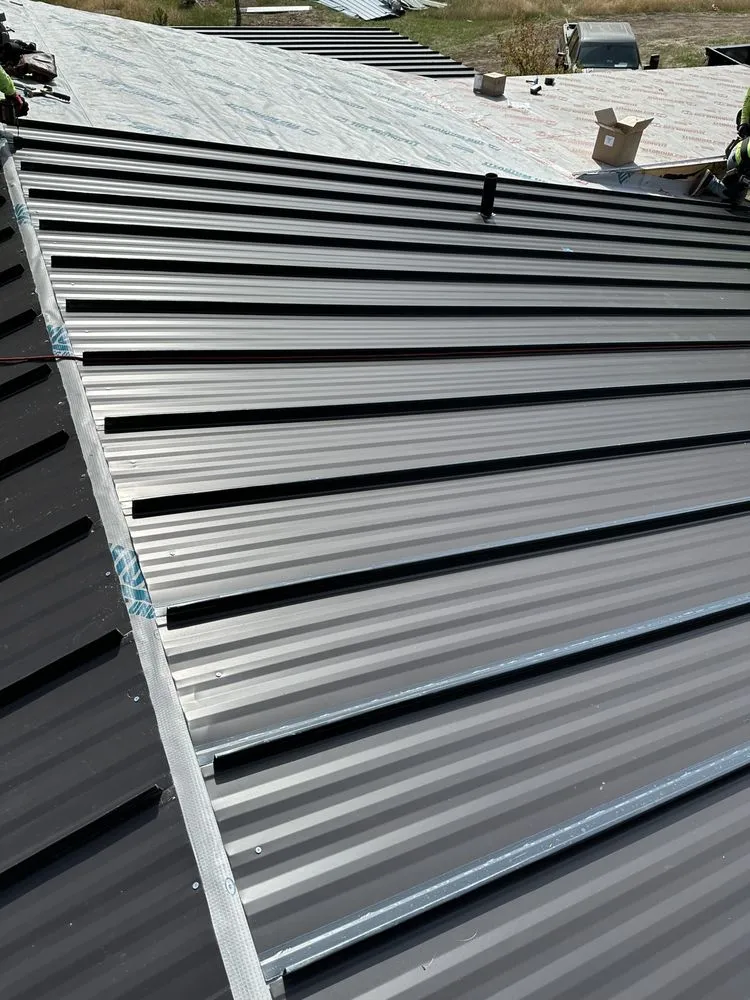 Slide of Essence Roofing