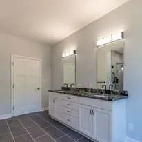 Essential Improvements Logo