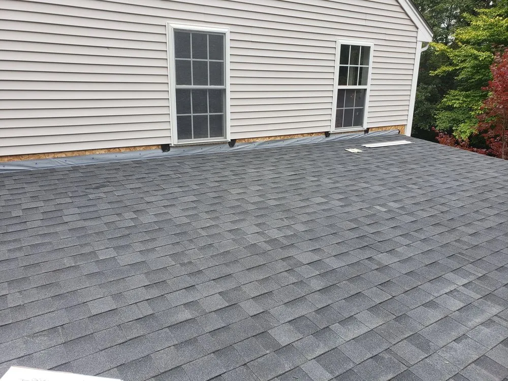 Slide of Essential Roofing