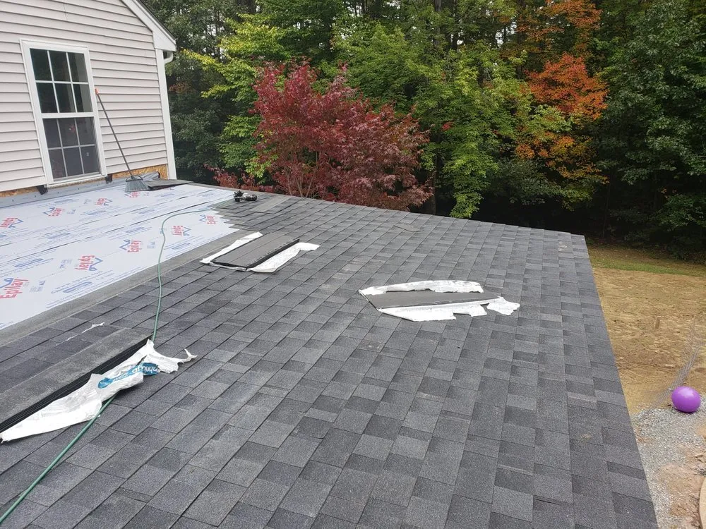 Slide of Essential Roofing