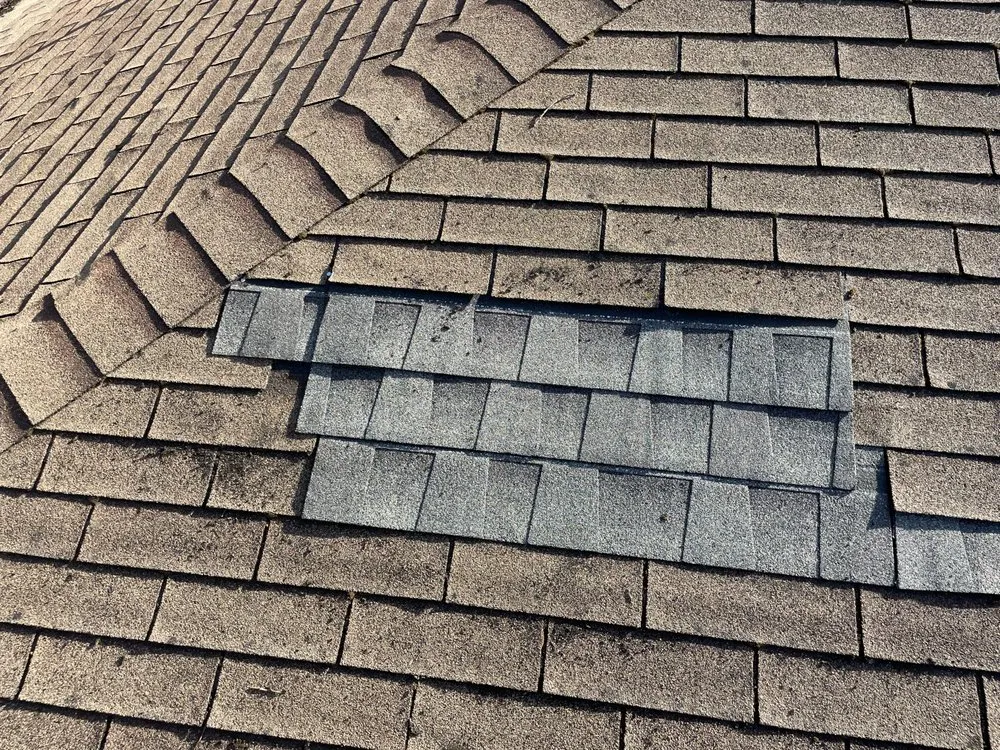 Slide of Essentials Roofing