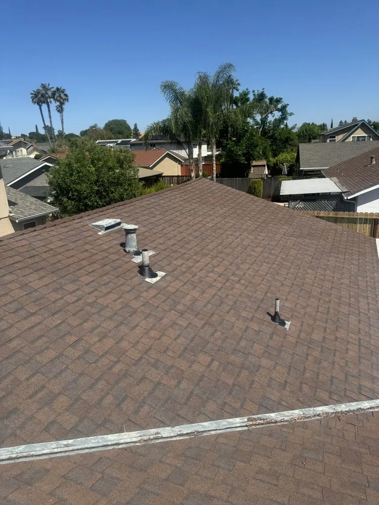 Slide of Essentials Roofing