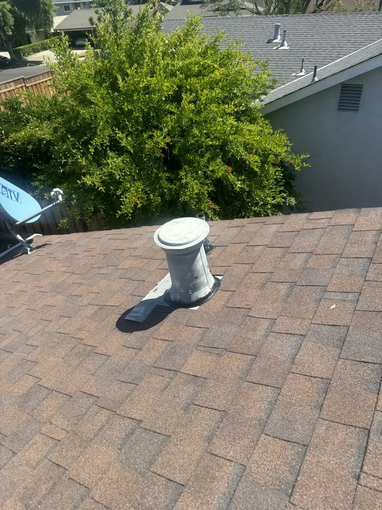 Slide of Essentials Roofing