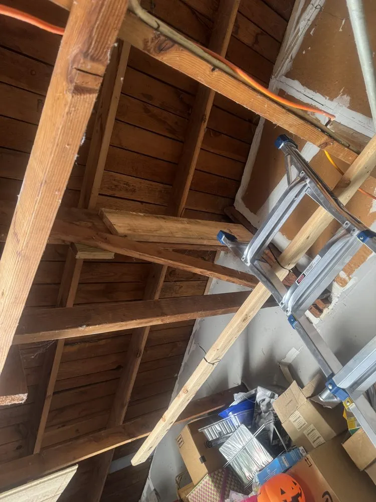 Slide of Essentials Roofing