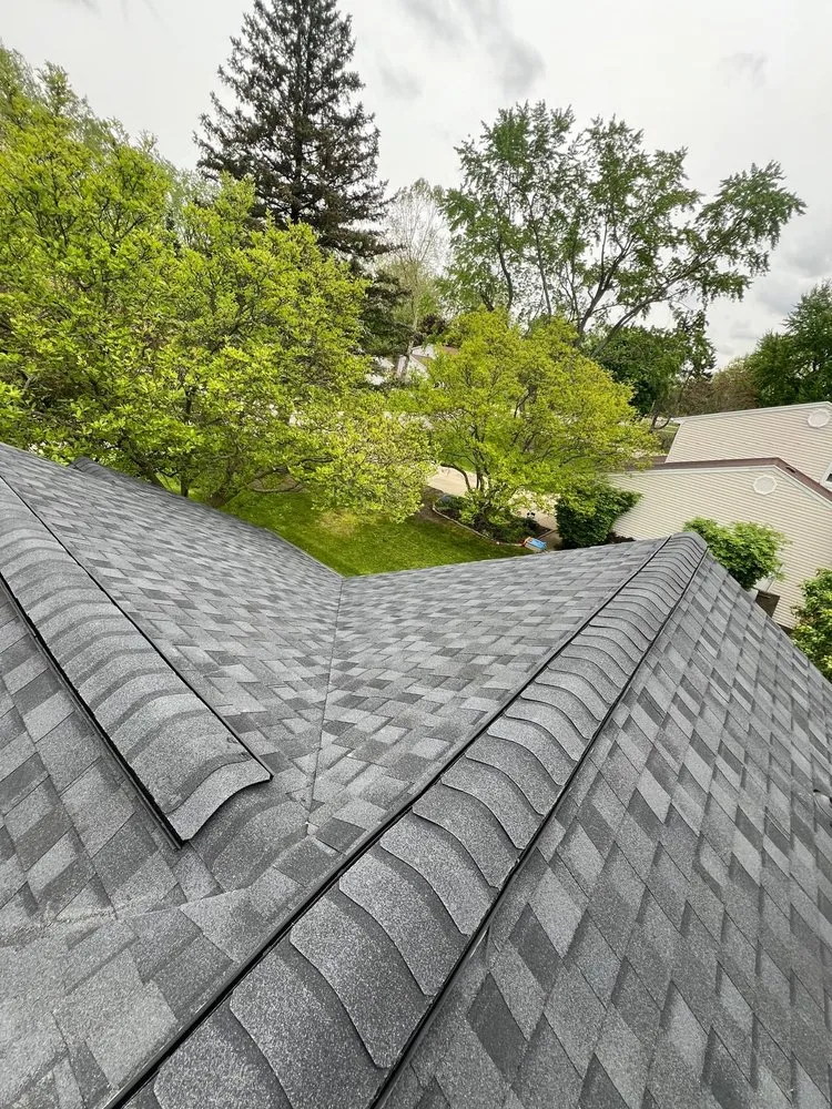 Slide of Esteban’s Roofing and Siding