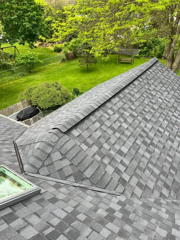 Slide of Esteban’s Roofing and Siding