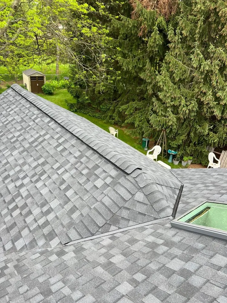 Slide of Esteban’s Roofing and Siding