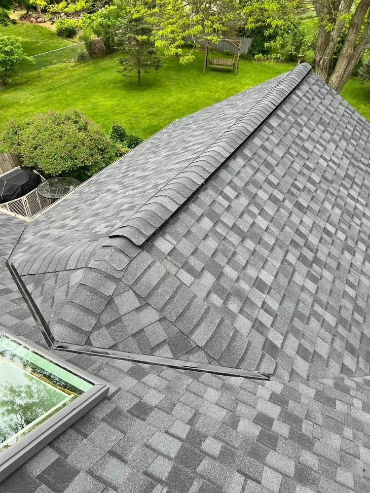 Slide of Esteban’s Roofing and Siding