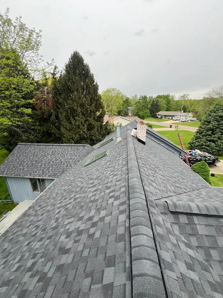 Slide of Esteban’s Roofing and Siding