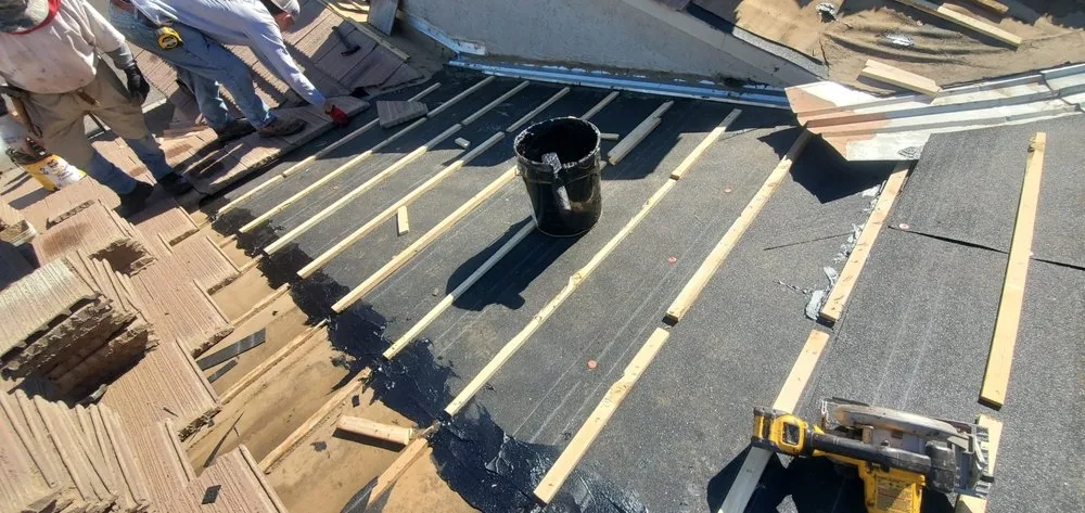 Slide of Estrella Roofing