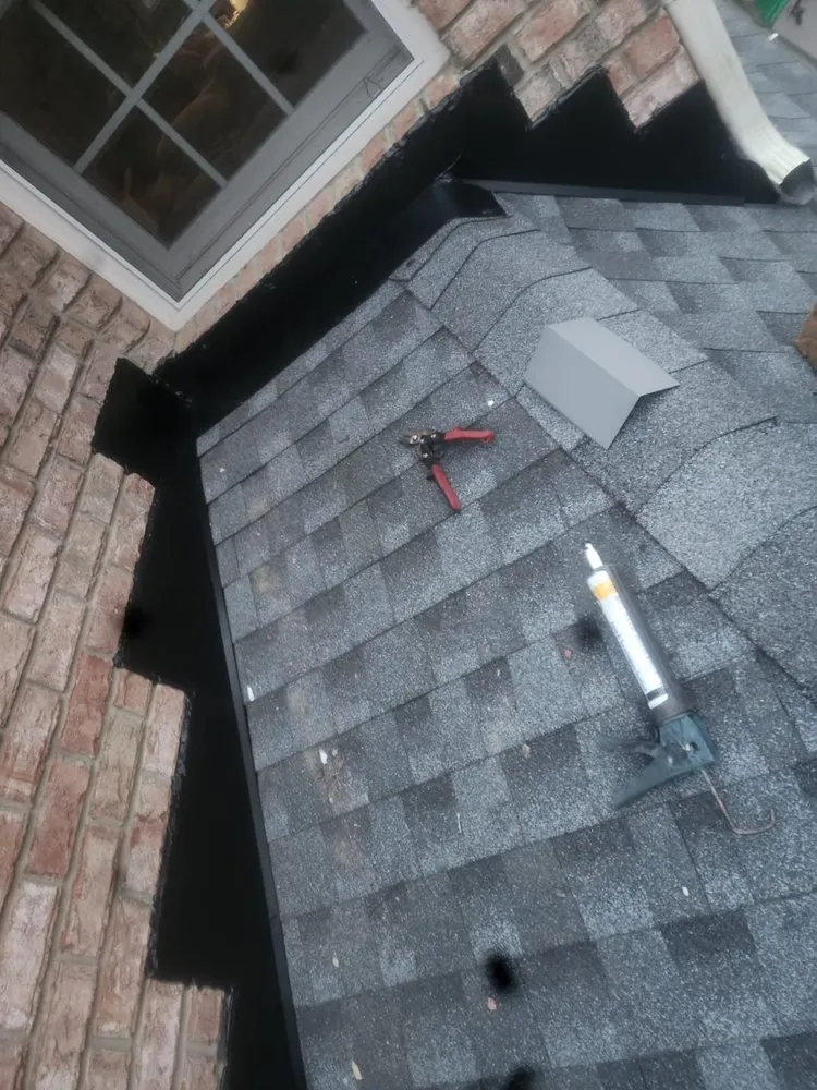 Slide of E&T Roofing