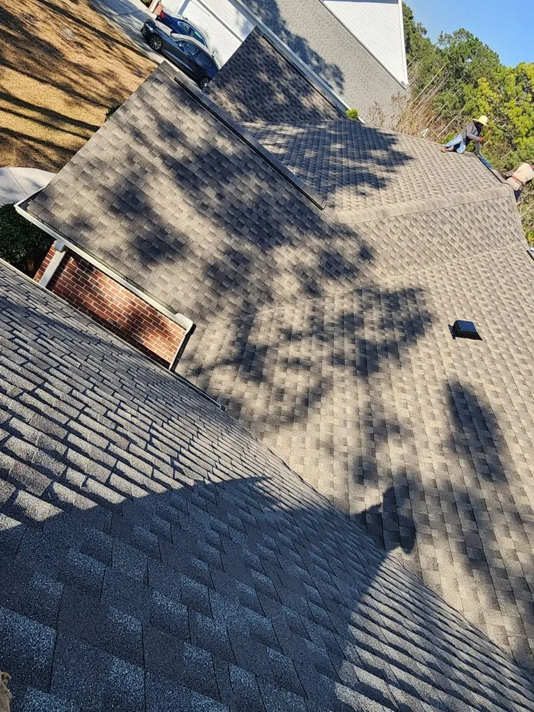 Slide of E&T Roofing