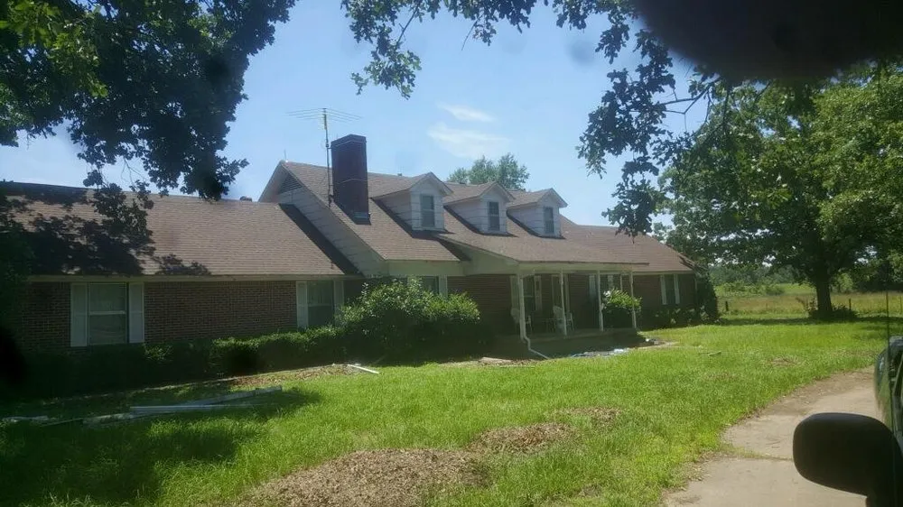 Slide of ETX Roofing