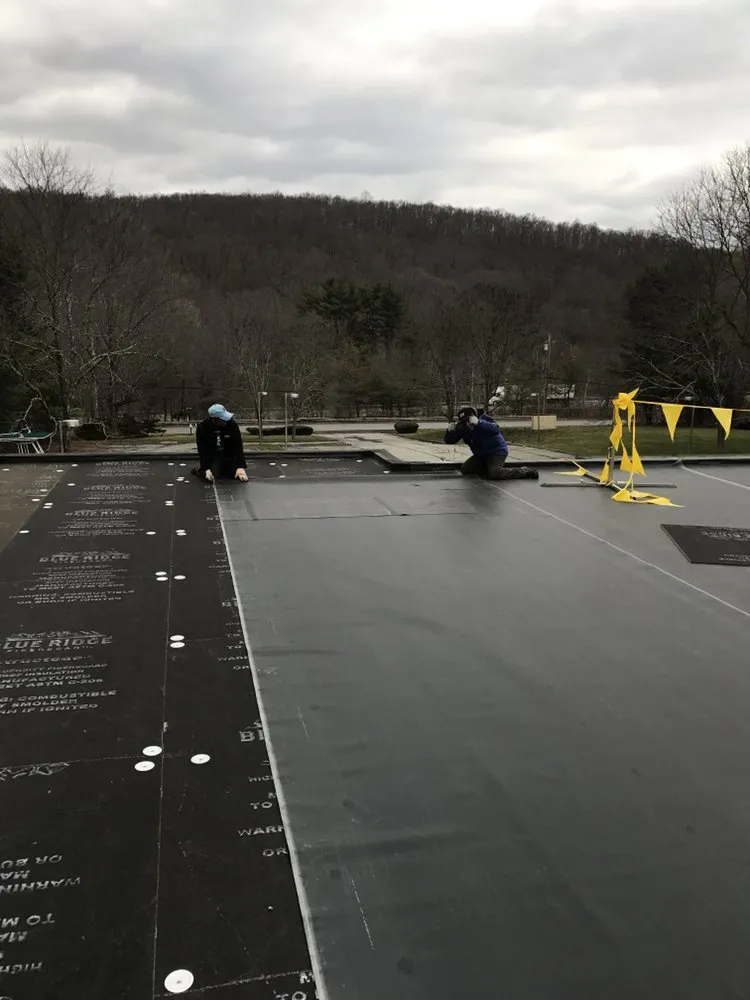 Slide of Evans Commercial Roofing