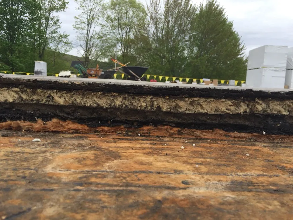 Slide of Evans Commercial Roofing