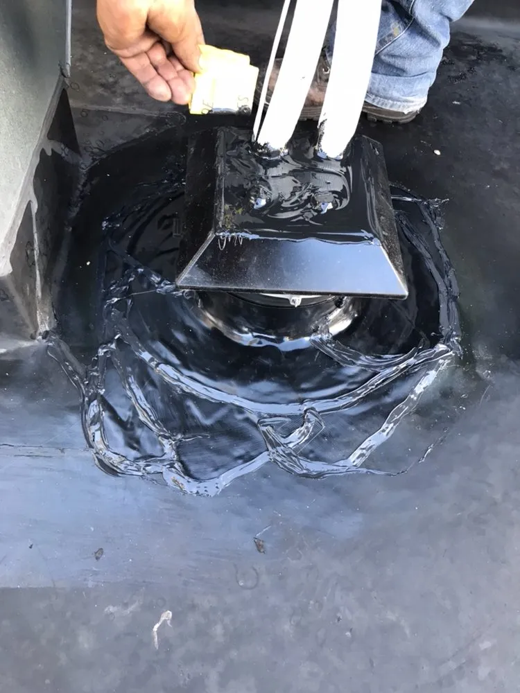 Slide of Evans Commercial Roofing