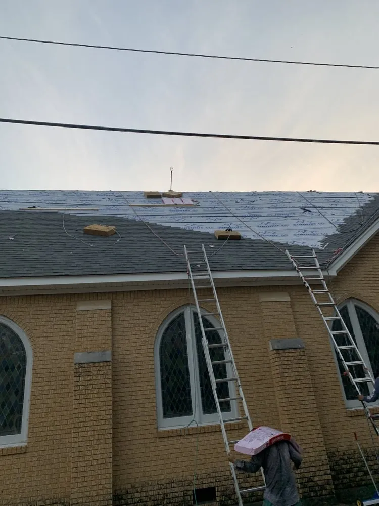 Slide of Evan's Roofing & Construction