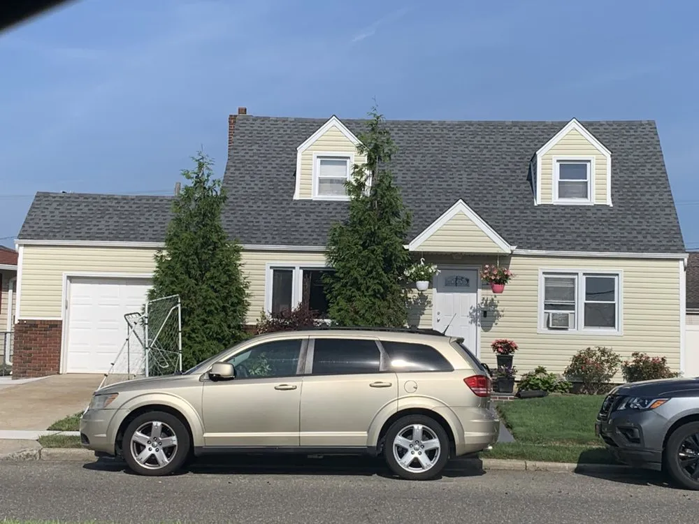 Slide of Eveready Roofing Company