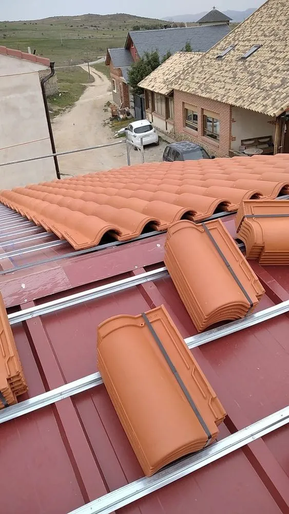 Slide of Everest Elite Roofing