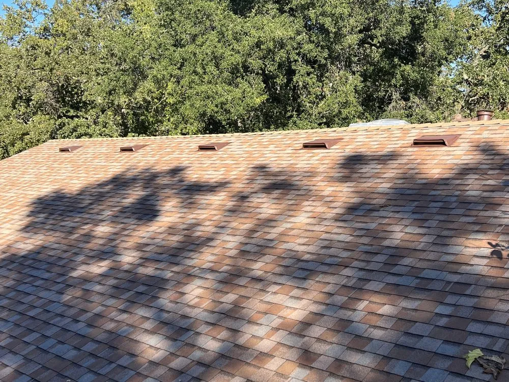 Slide of Everest Roofing