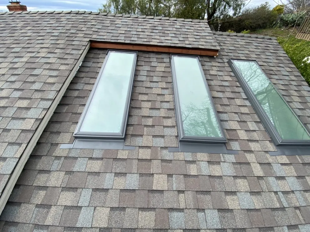 Slide of Everest Roofing