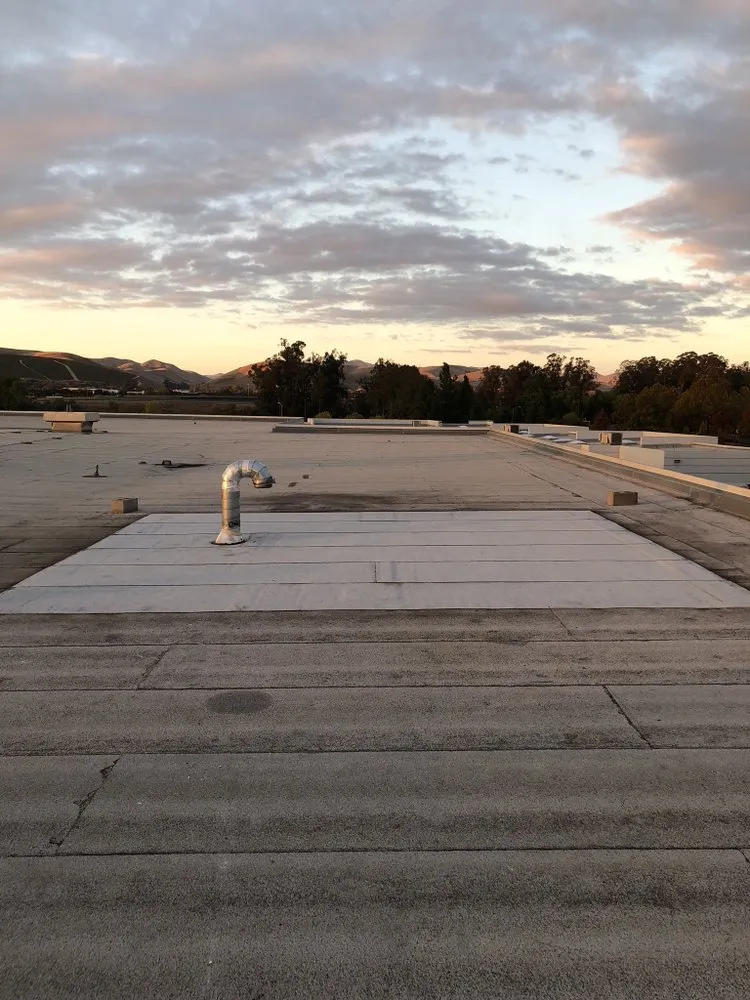 Slide of Everest Roofing