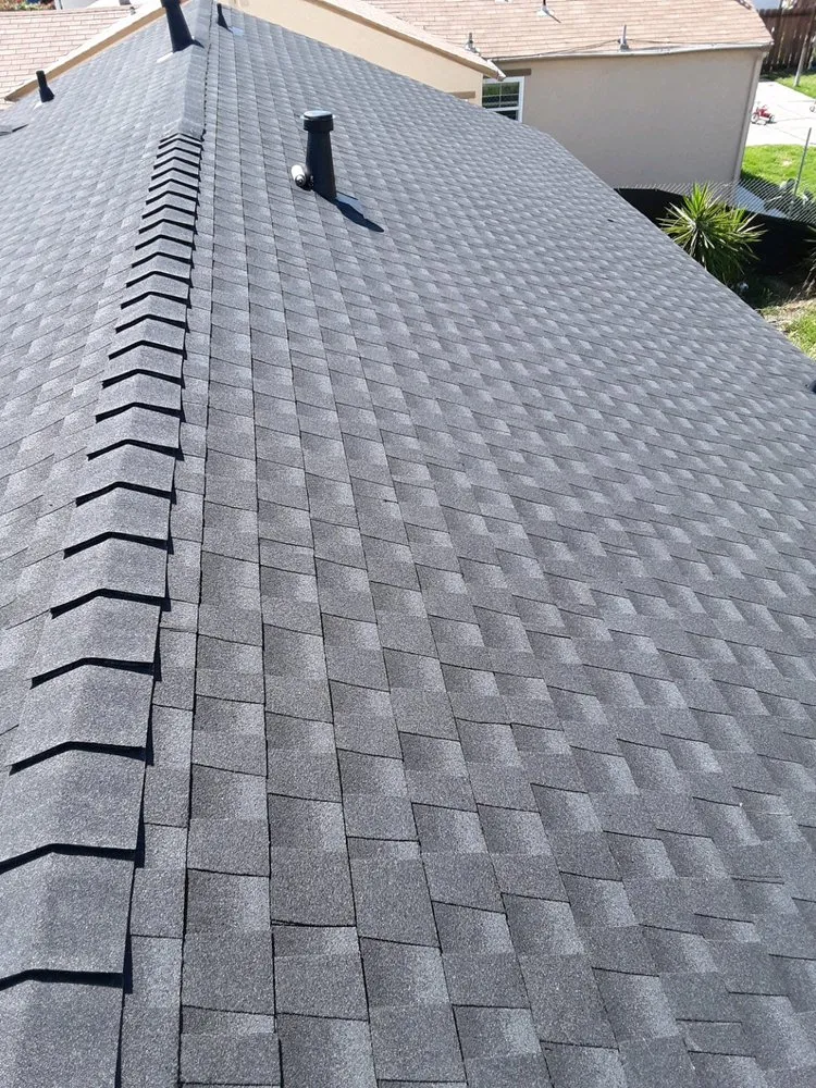 Slide of Everest Roofing