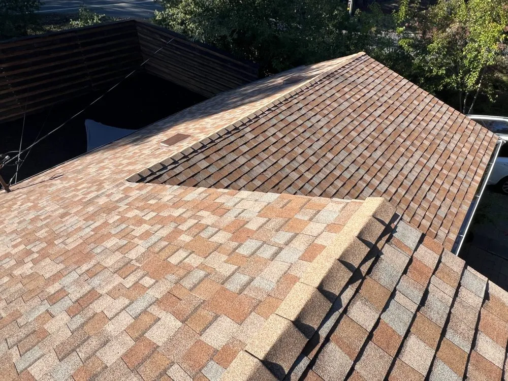 Slide of Everest Roofing