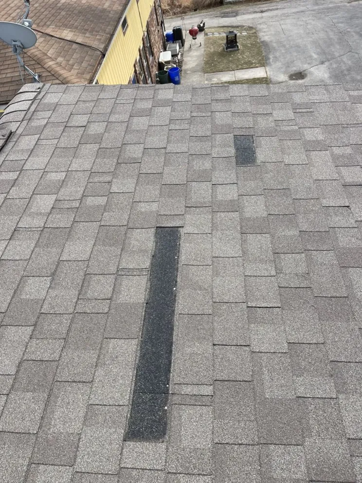 Slide of Everest Roofing