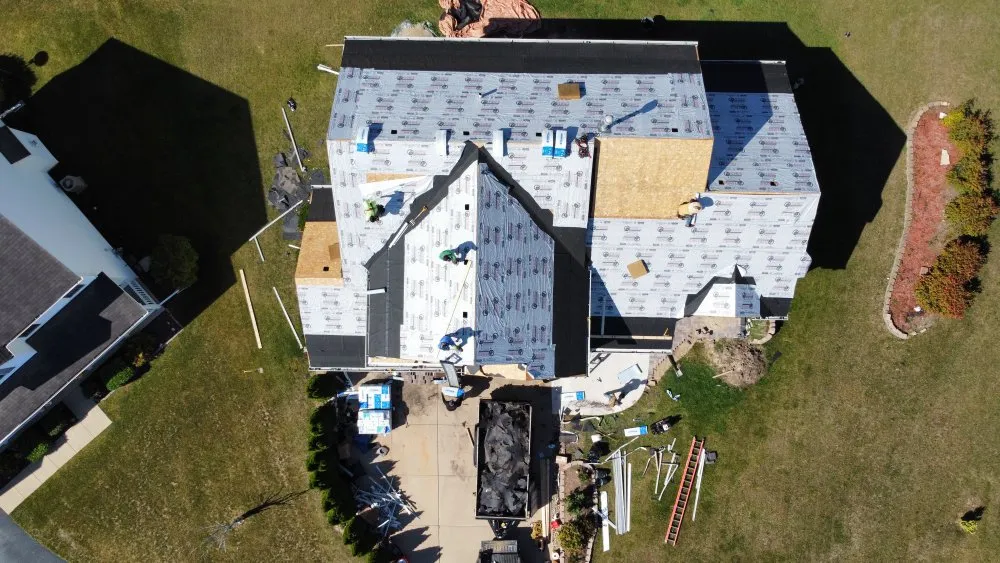 Slide of Everest Roofing