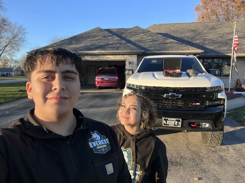 Slide of Everest Roofing