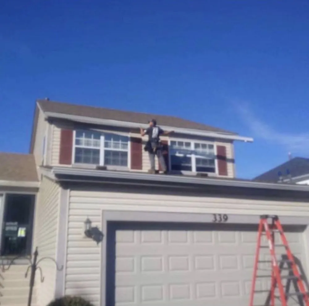 Slide of Everest Roofing