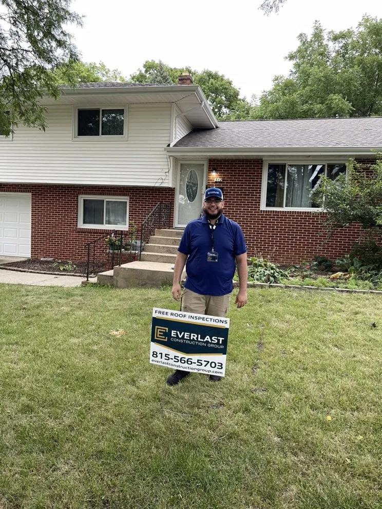 Slide of Everest Roofing