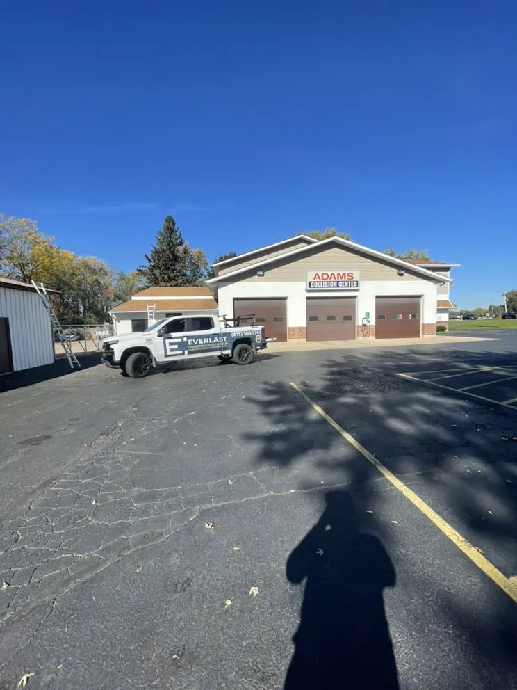 Slide of Everest Roofing