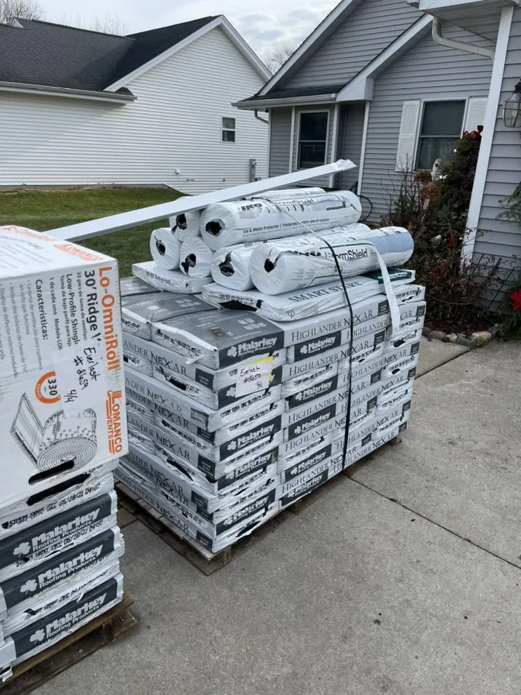 Slide of Everest Roofing