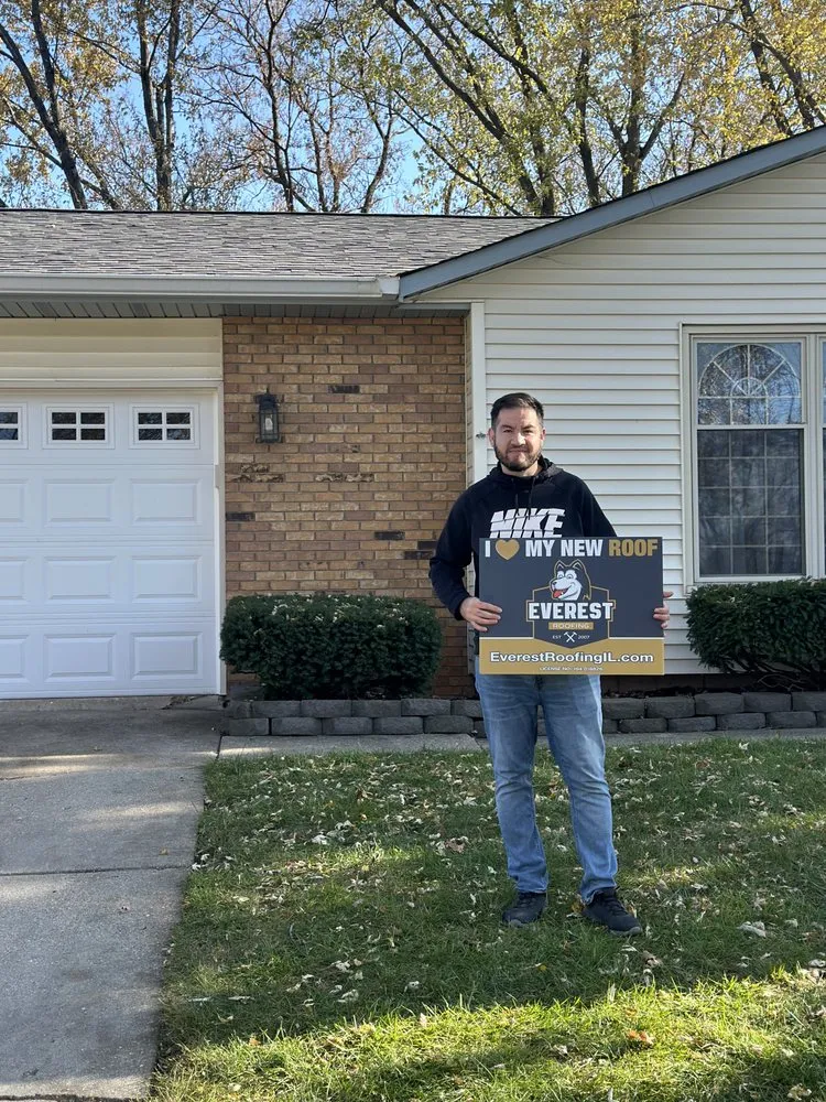 Slide of Everest Roofing