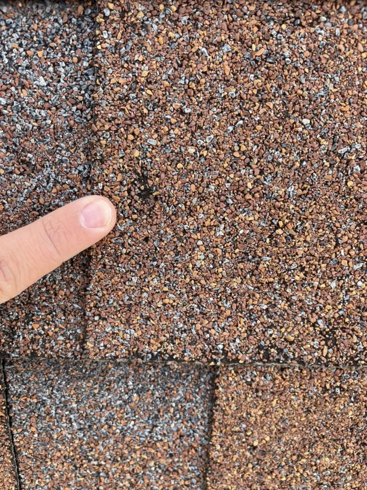 Slide of Everest Roofing