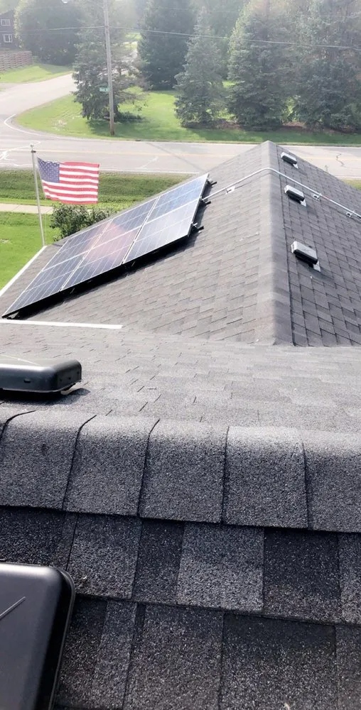 Slide of Everest Roofing