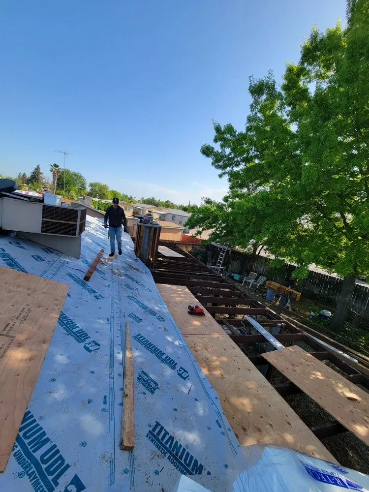 Slide of Everest Roofing