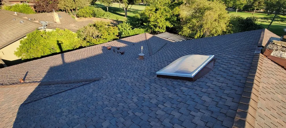 Slide of Everest Roofing