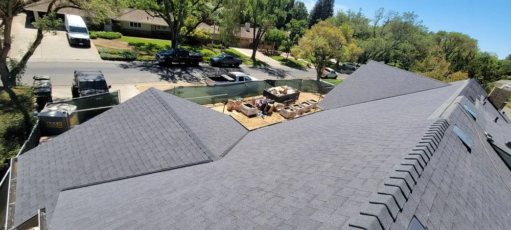 Slide of Everest Roofing