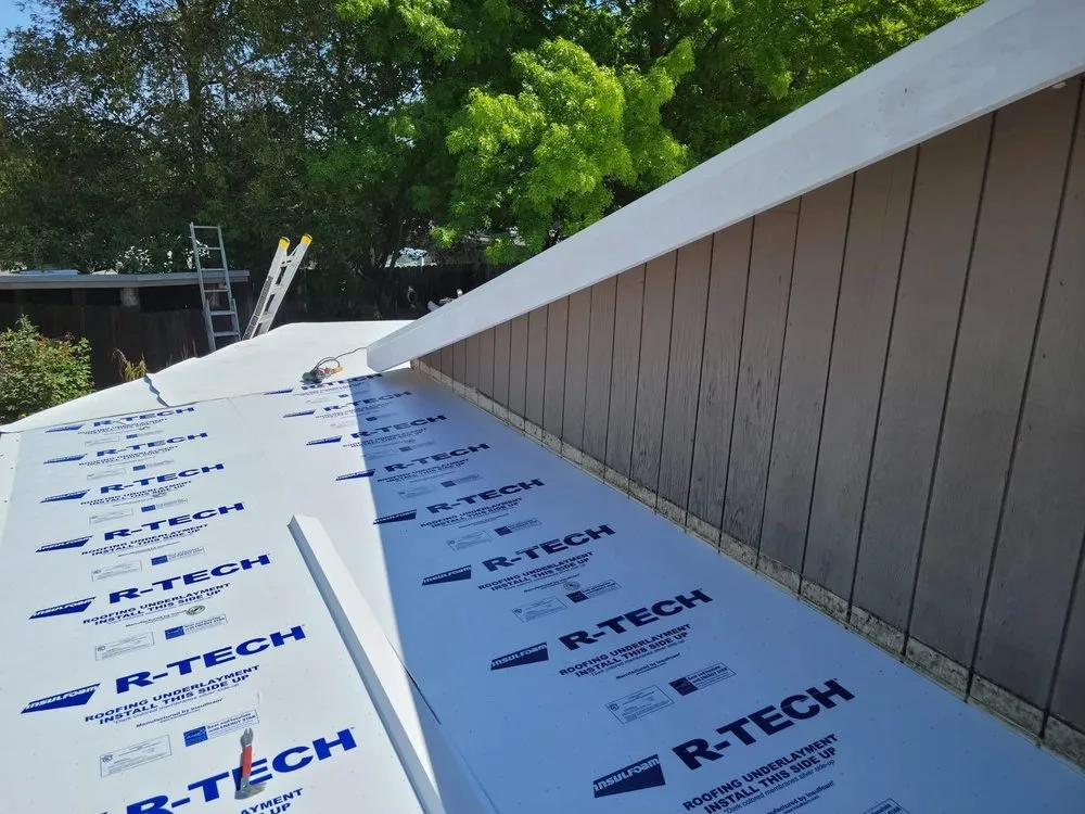 Slide of Everest Roofing