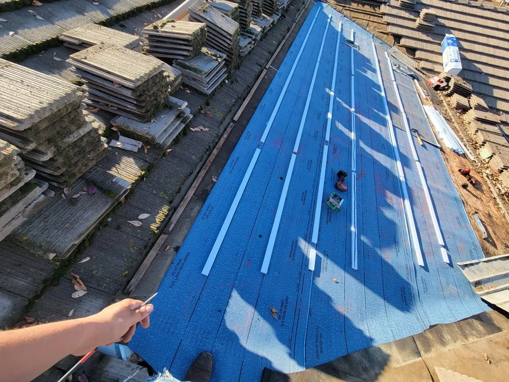 Slide of Everest Roofing