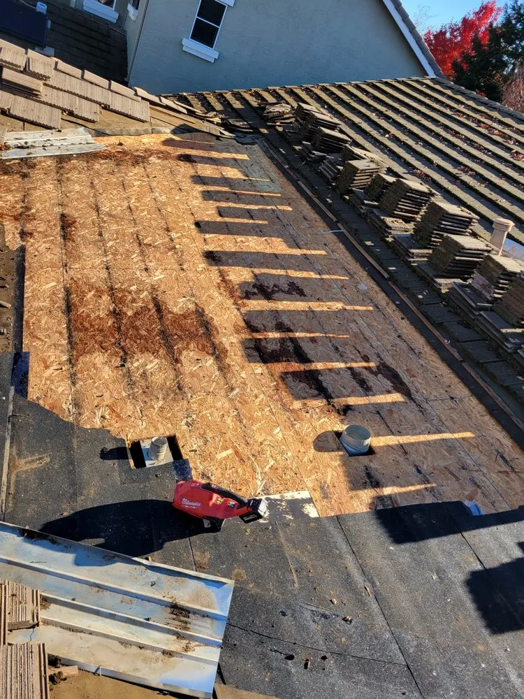 Slide of Everest Roofing