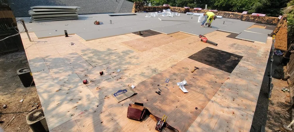 Slide of Everest Roofing