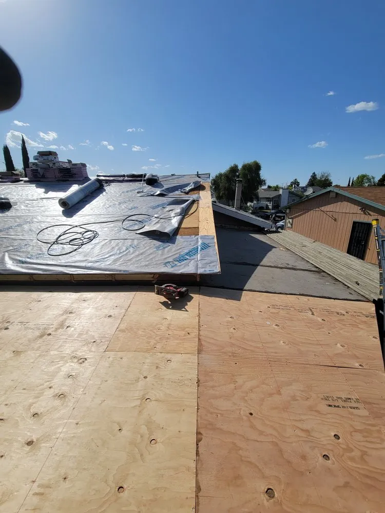 Slide of Everest Roofing