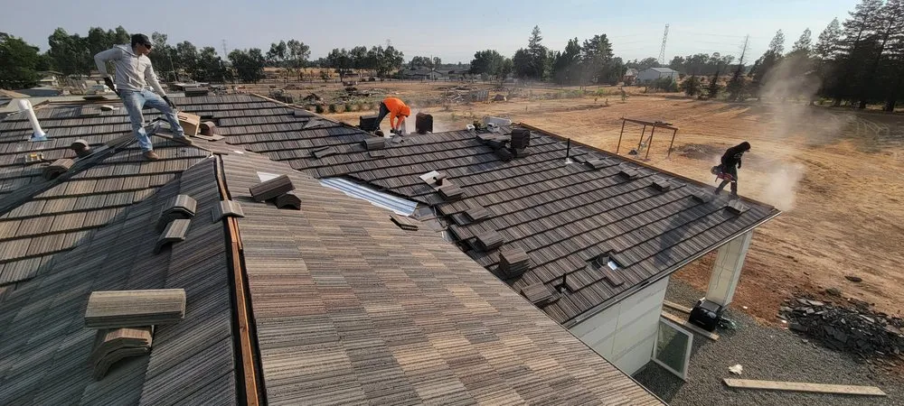 Slide of Everest Roofing